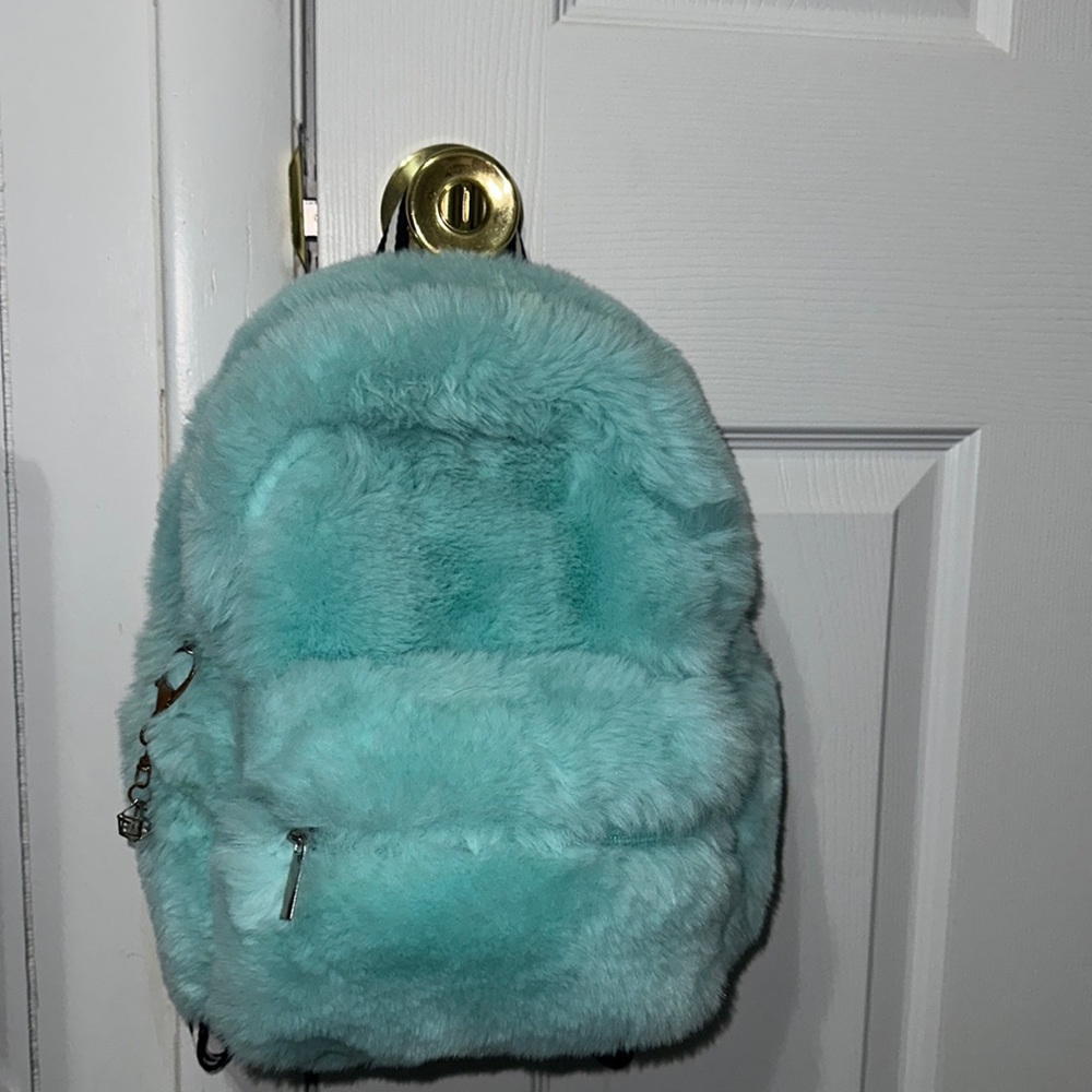 Claire’s Blue Furry Star Mini Backpack